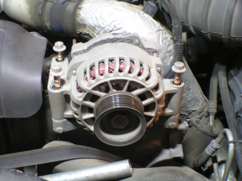 2000 Ford Excursion - The alternator is a crucial component in a vehicle's electrical system, responsible for charging the battery.