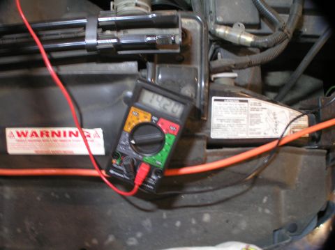 2000 Ford Excursion - Testing the voltage at the new alternator -- it reads 14.20 volts. With the old alternator, it only read 11.80.