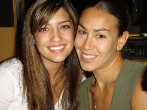 2004 Ford F-150 - Two women are pictured smiling in this photograph, with a website address visible at the bottom.