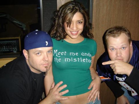 2004 Ford F-150 - Three individuals pose for a photo, with text visible on the woman's shirt.