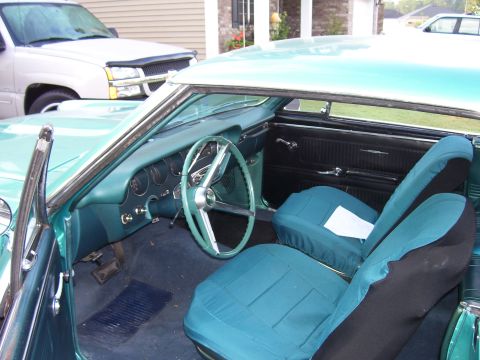 1967 Pontiac Lemans - Interior view of a 1967 Pontiac Lemans, showing the dashboard and front seats.