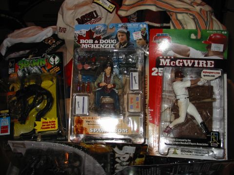 1991 Ford Bronco - Action figures and collectibles including Bob & Doug McKenzie, Mark McGwire, and Spawn.