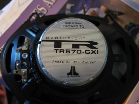 1995 Ford Bronco - Close-up of a JL Audio TR570-CXi speaker, showing model and brand details.