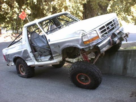 1995 Ford Bronco - This 1995 Ford Bronco has been heavily modified for off-road use, a roll cage and large tires.