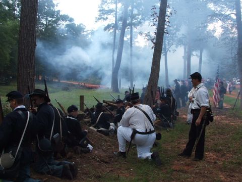 1966 Ford Ranchero - Soldiers in Civil War attire participate in a reenactment with smoke and trees visible.