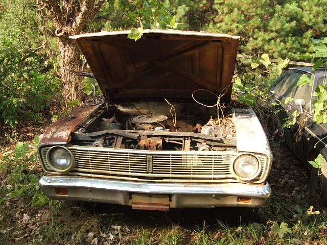 1966 Ford Ranchero front view, hood open, showing engine bay, parked outdoors