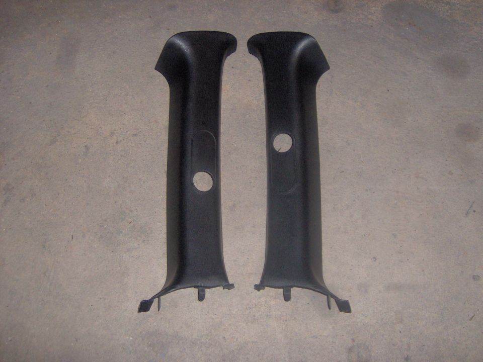 Pair of black interior trim pillars