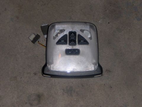 1994 Ford Probe - This overhead console part has map lights and roof light controls.