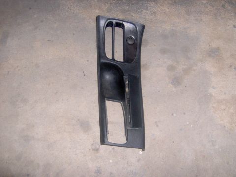 1994 Ford Probe - This black interior door panel part features air vents and a cutout for the door handle mechanism.
