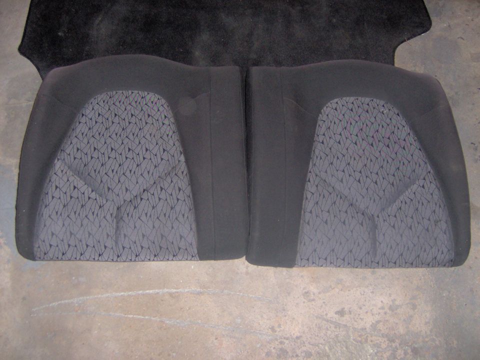 Black interior seats with patterned fabric inserts