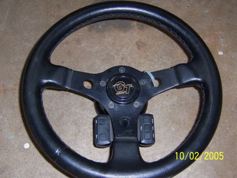 1987 Ford Bronco - Grant GT steering wheel with added button modules.