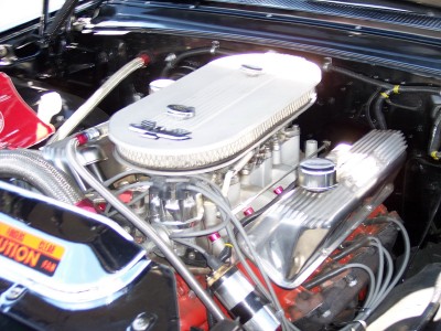 1972 Ford Ranchero - Close-up of a modified engine bay, showing chrome components and wiring details.
