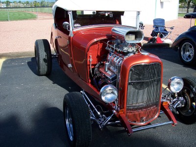1972 Ford Ranchero - This 1932 Ford hot rod features a prominent chrome grille and a supercharged V8 engine.