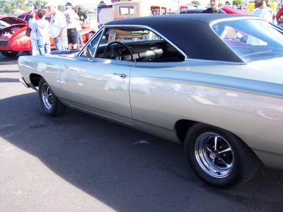 1972 Ford Ranchero - A silver 1972 Ford Ranchero with a black roof is parked on a sunny day.