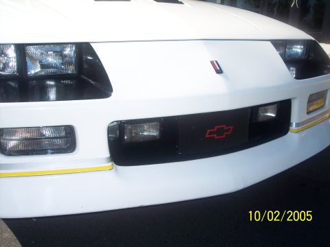 1988 Chevrolet Camaro - Front view of a 1988 Chevrolet Camaro, showing the grille and headlights.