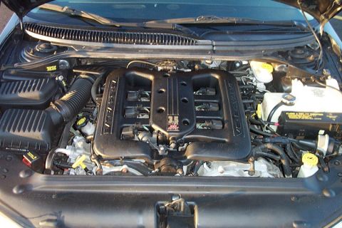 1999 Chrysler 300M - Engine bay of a 1999 Chrysler 300M, the 3.5L V6 engine.