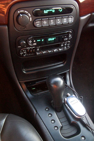 1999 Chrysler 300M - Interior view of a 1999 Chrysler 300M, showing the center console with gear shifter and audio controls.
