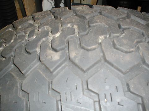 1979 Ford Bronco - A close-up view of a tire's tread pattern is visible, with a watermark for Supermotors.net in the lower right corner.