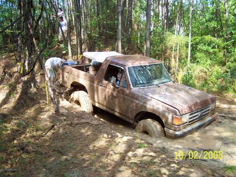 1987 Ford Bronco - Muddy 1987 Ford Bronco stuck deep in a wooded area on 10/02/2005.