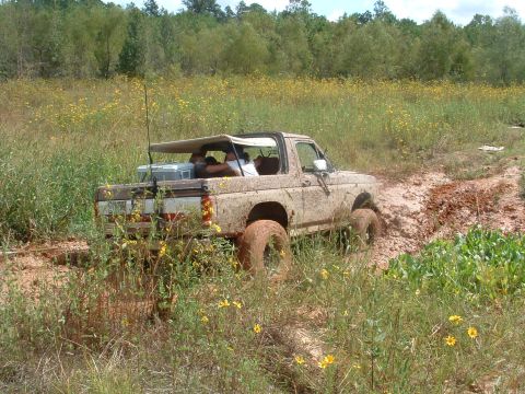 1993 Ford Bronco - 1993 Ford Bronco stuck in mud during an off-road excursion.