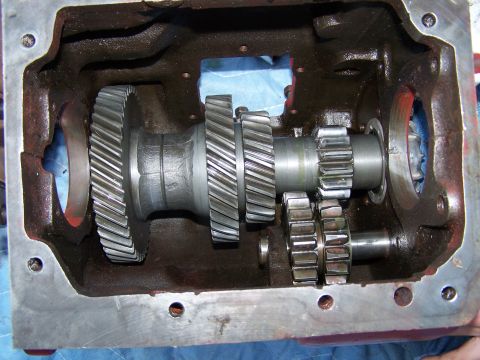 1979 Ford F-150 - Internal view of transmission gears within a cast iron housing, showing various gear sets and shafts.
