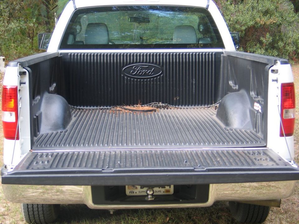 2004 Ford F-150 tailgate and bed interior with Ford logo