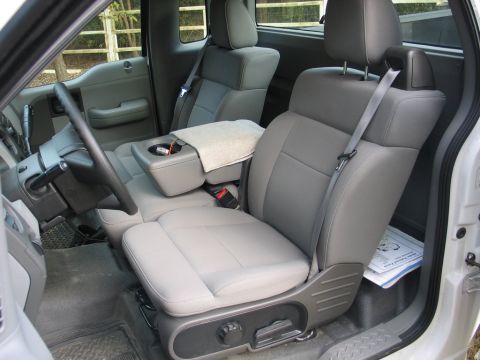 2004 Ford F-150 - Interior view of a 2004 Ford F-150, highlighting the front seating area and controls.