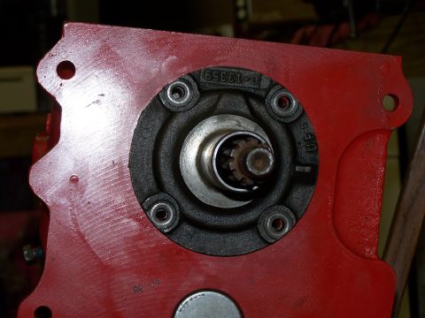 1979 Ford F-150 - Close-up of a red metal part with a circular opening showing splines and part number C-13359.
