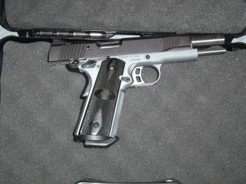 1988 Ford Bronco - A handgun is shown in its case, with visible text at the bottom right corner.