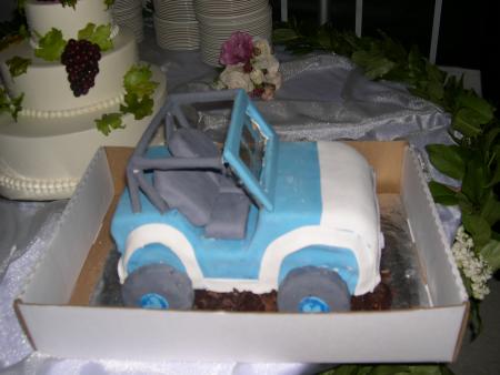 1971 Ford Bronco - A cake designed to resemble a jeep is displayed next to a tiered wedding cake.