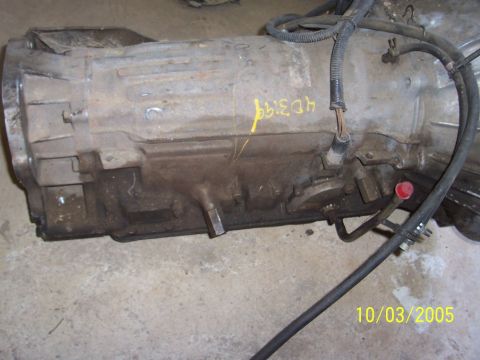 1994 Jeep YJ - Close-up of an automatic transmission with handwritten yellow markings.