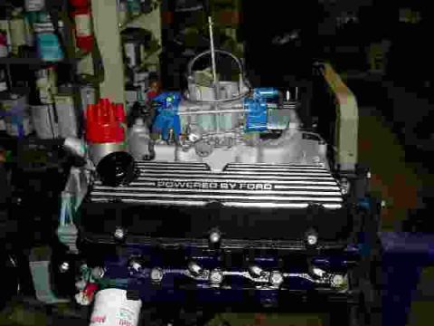 1969 Ford Bronco - Engine with "POWERED BY FORD" valve covers and aftermarket ignition parts.