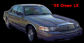 2003 Ford Crown Victoria - This 2003 Ford Crown Victoria LX sedan is shown from a 3/4 front perspective.