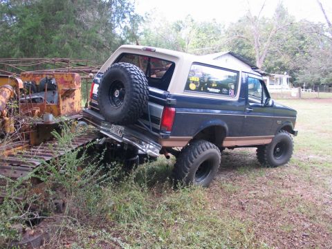 1995 Ford Bronco - This 1995 Ford Bronco is seen from the rear, with its spare tire mounted on the tailgate.
