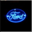 1993 Ford Bronco - A glowing blue Ford logo is displayed against a dark backdrop.