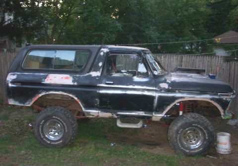 1978 Ford Bronco - This 1978 Ford Bronco is undergoing modifications, a hood scoop and lifted suspension.