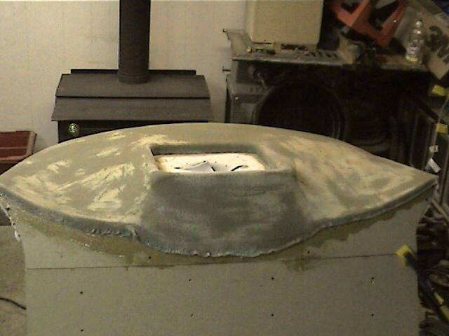 Than you pull over your material and staple or hot glue it to the frame and start adding your fiberglass resin.........