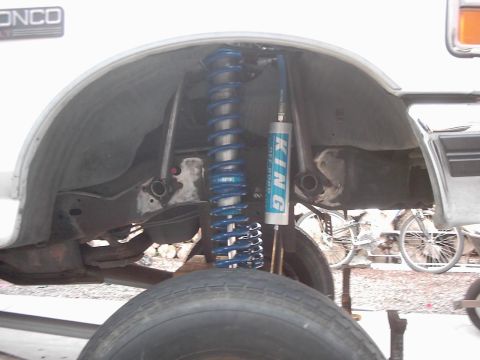 1978 Ford Bronco - Close-up of the suspension system on a 1978 Ford Bronco, aftermarket King shocks.
