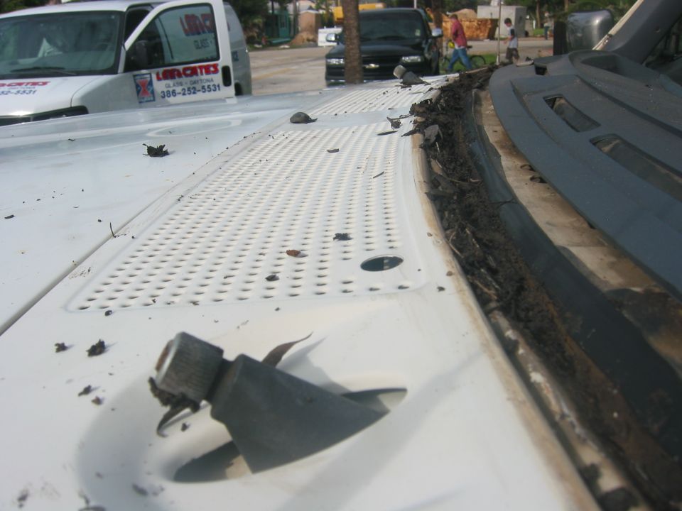 lots of mud/sand behind the weather stripping
