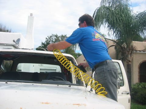 1989 Ford Bronco - Coolest picture ever. They are using my air to blast the dirt away.