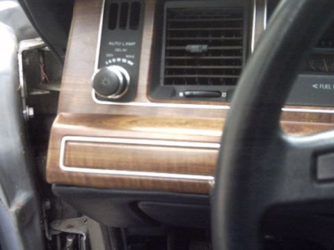 1991 Ford Crown Victoria LTD - Interior view of a 1991 Ford Crown Victoria LTD, showing the dashboard details and steering wheel.