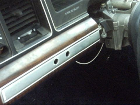 1991 Ford Crown Victoria LTD - Interior view of a 1991 Ford Crown Victoria LTD, highlighting dashboard details and steering column.