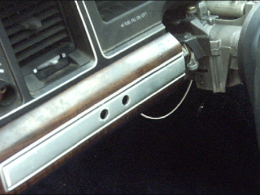 1991 Ford Crown Victoria LTD interior showing dashboard trim, air vent, and steering column