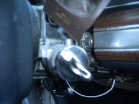 1991 Ford Crown Victoria LTD - Interior view of a car's ignition and dashboard trim panel.