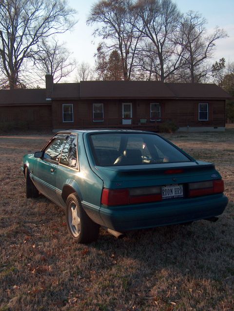 1993 Ford Mustang - In front of the long term home renovation project. The interior was so godawful I haven't even gotten to the exterior yet. Looks best from…