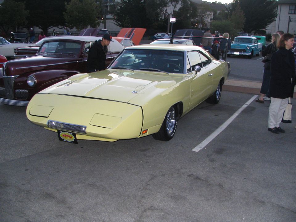 Yellow 1970 Dodge Charger Daytona front view with Mopar badge