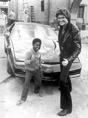 1986 Ford Bronco - David Hasselhoff and Gary Coleman pose with the iconic KITT car, a modified Pontiac Trans Am.