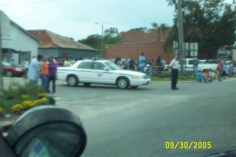 1998 Ford Crown Victoria - A police car drives by spectators during a parade on September 30, 2005.