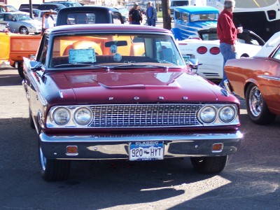 1972 Ford Ranchero - Front view of a 1965 Ford pickup truck with a prominent grille and dual headlights.