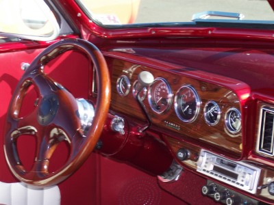 1972 Ford Ranchero - Interior view of a custom hot rod, a wood-grain dashboard and aftermarket gauges.